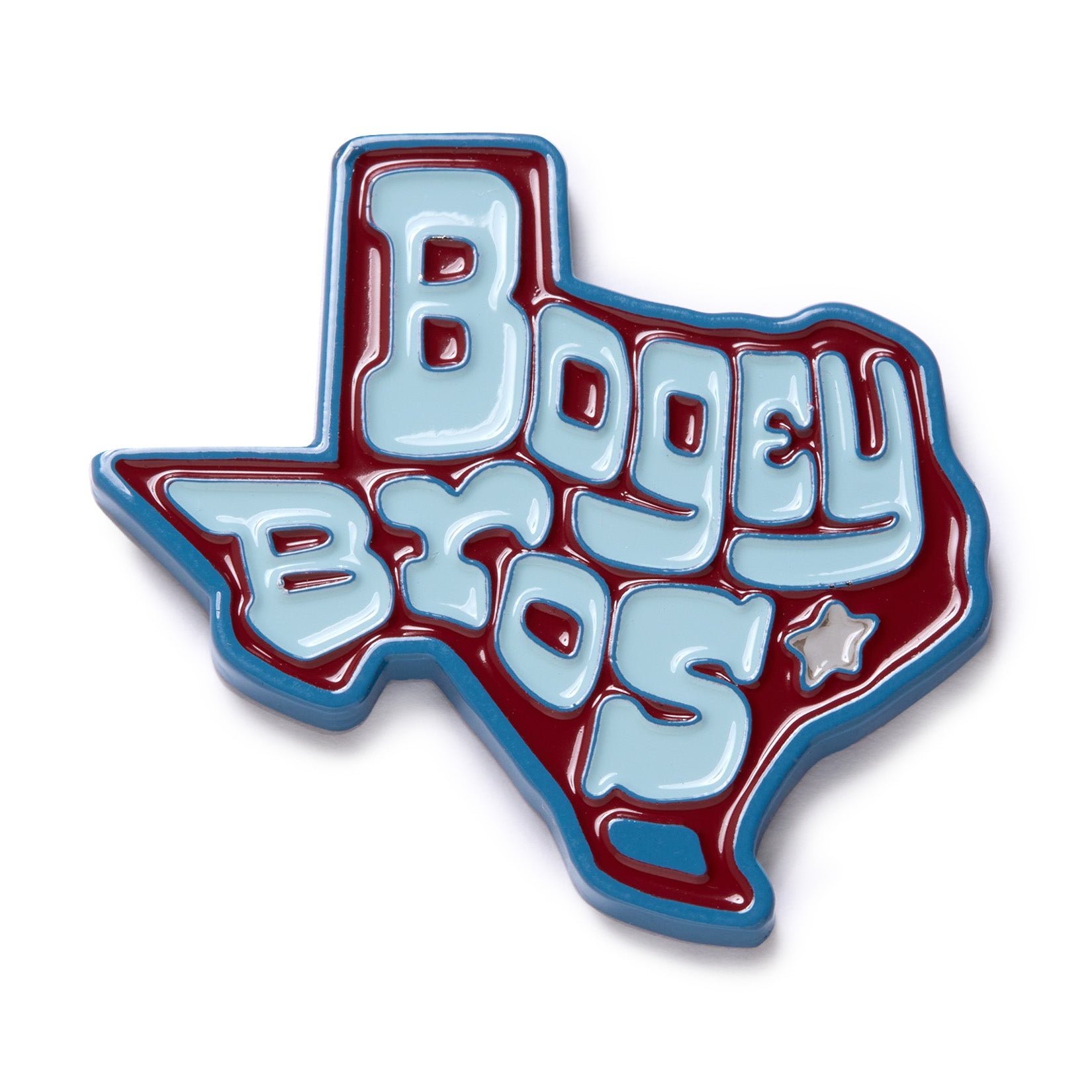 A pin shaped like Texas with “Bogey Bros” in bold, light blue letters outlined in white and blue on a maroon background. A small star appears near the bottom right. The edges are also outlined in blue.