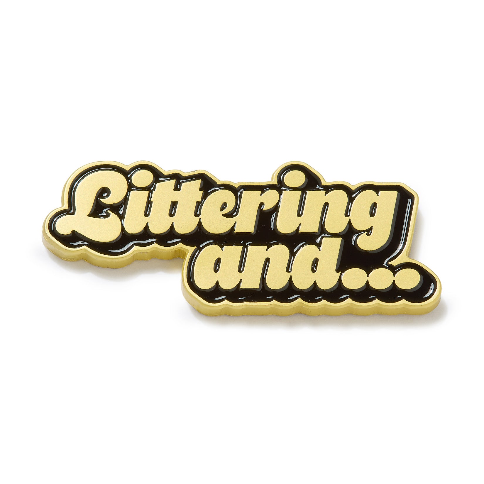 A gold-outlined ball marker features bold, black-shadowed text reading “Littering and...” in a playful script on a crisp white background. This unique accessory—titled “Littering and... - Ball Marker”—boasts iron nickel plating for extra durability and a brilliant finish.