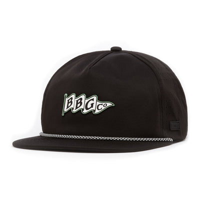 The BB Flag - Unstructured Flat Bill Hat - Snapback is a black flat brim hat with a silver braided rope, green and white "BBG Co." pennant patch, performance material, and side panel ventilation holes for comfort.
