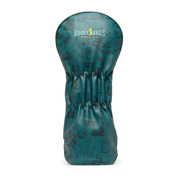 The Desert Golf - Driver Headcover in green features the Bogey Bros Golf Co logo on top and embroidered playful black doodles—like golf balls, trash cans, snakes, and octopuses—on padded, slightly glossy premium PU leather.