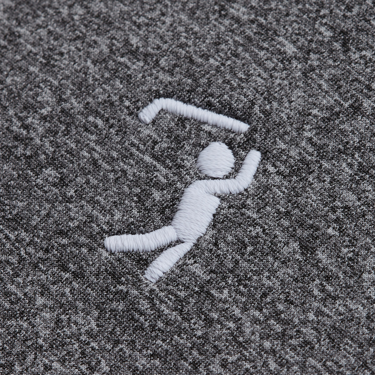 A white embroidered stick figure holding a boomerang appears on the textured heather gray fabric of this hoodie. The figure’s right arm is raised and bent at the elbow, while the left arm is outstretched. The athletic fit of the Heather Gray Hoodie ensures comfort for both active days and relaxation.