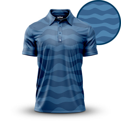 The Washed Up - Polo is a short-sleeved, collared shirt with a wavy blue stripe pattern in various shades. Moisture-wicking fabric and athletic fit ensure comfort. An enlarged circle shows wave detail; soft shadow on white background.