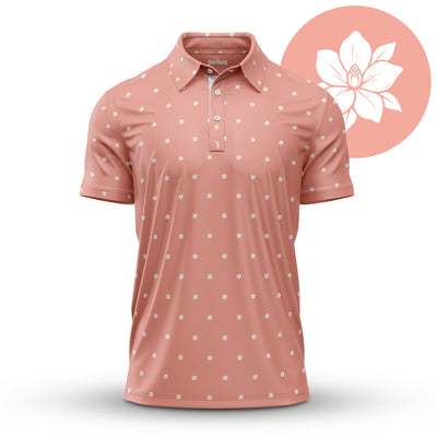 The In Bloom - Polo is a short-sleeved, dusty pink shirt with a small white floral print, athletic fit, classic collar, and moisture-wicking comfort. A large white flower in a pink circle mirrors the shirt’s floral design.