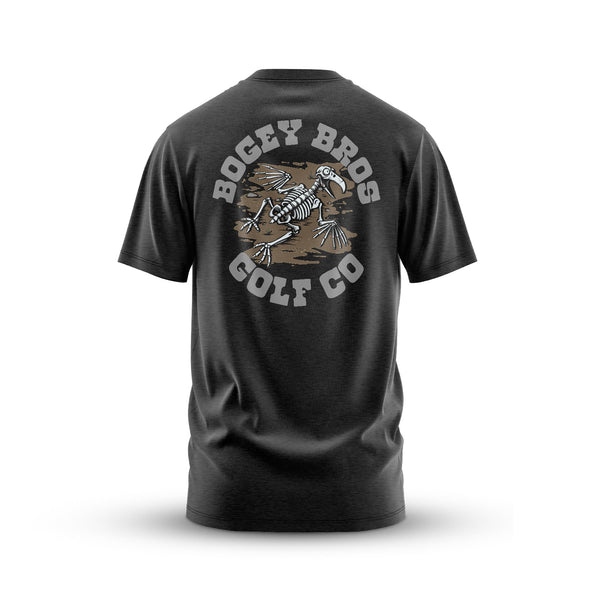 The Dead On Arrival - T-Shirt features a black jersey design with a back graphic of a bird skeleton on a brown patch and curved white "BOGEY BROS GOLF CO." text. This unisex tee offers an athletic fit and short sleeves for stretchy comfort.