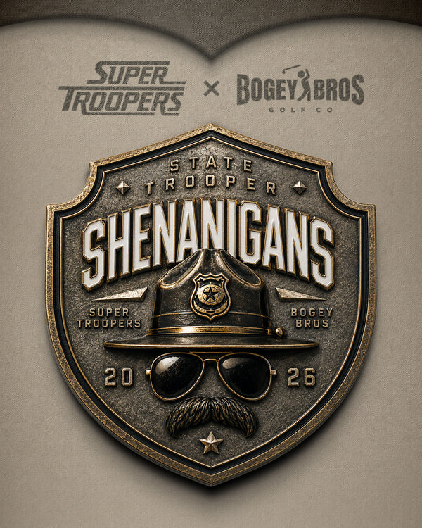 A metallic police badge reads STATE TROOPER SHENANIGANS with a cartoon hat, sunglasses, and mustache. Super Troopers and Bogey Bros are on the badge. Super Troopers x Bogey Bros Golf Co is above, with the year 2026 on the badge.