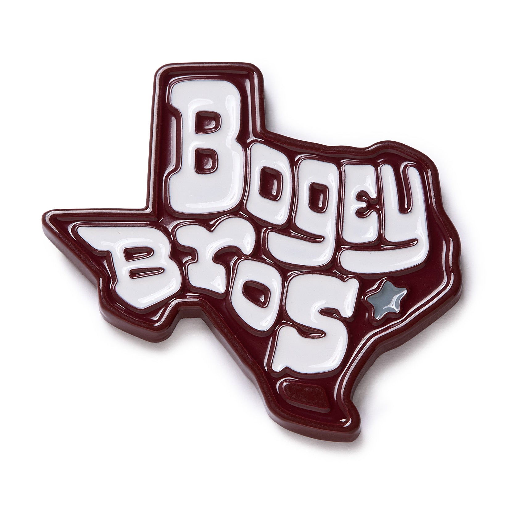 A glossy pin shaped like Texas features bold, white, stylized text reading “Bogey Bros” outlined in maroon, with a small silver star on the right side near the word “Bros.”.