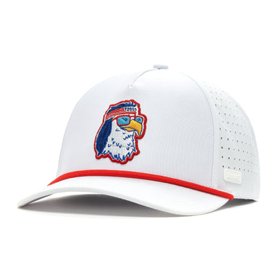 The FREEagle Performance Golf Rope Hat is a white snapback with red brim trim, a perforated back, and sweat-resistant fabric. The front features an embroidered eagle head with red sunglasses and headband, outlined in blue and yellow.