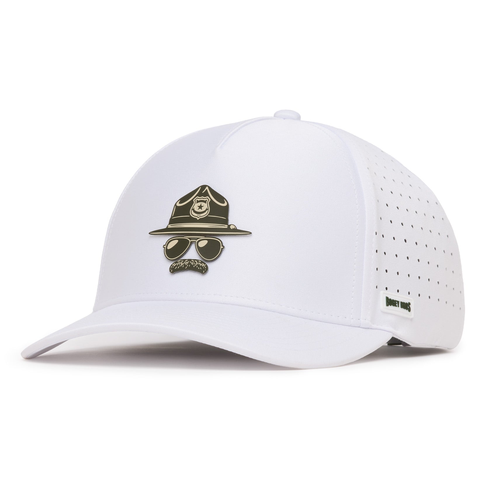 A white baseball cap with a pin of a police hat, sunglasses, and mustache on the front. The cap has small ventilation holes on the side and a small green and white tag reading DOME TIMES. The background is plain white.