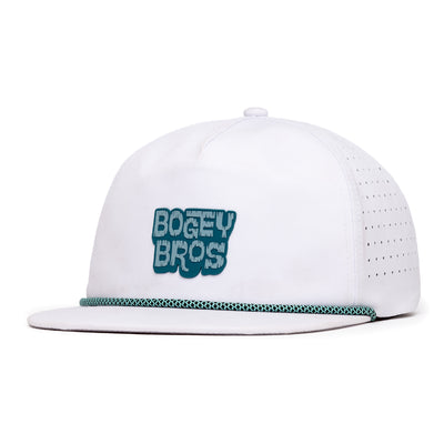 The Tiki Flat Bill is a white, unstructured flat brim snapback with a perforated back panel, green and white rope above the brim, and features an embroidered “BOGEY BROS” logo in bold green and white block letters on the front.