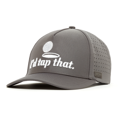 The "I’d Tap That - Performance Golf Hat - Snapback" is a gray cap with side ventilation, crafted from sweat stain resistant performance material. It features a white embroidered golf ball, bold "Id tap that." text, and a metallic logo on the brim.