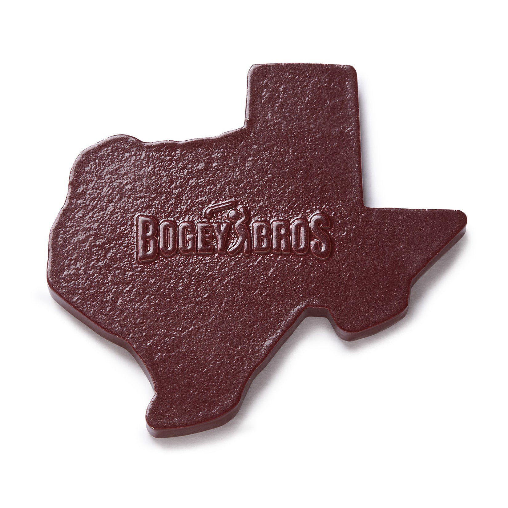 A chocolate piece shaped like the state of Texas, embossed with the words BOGEY BROS and a golfer silhouette in the center. The chocolate has a smooth, glossy texture and a rich, dark brown color.