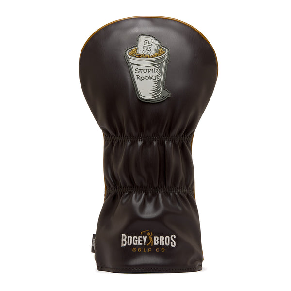 Introducing the Liter-O-Cola - Driver Headcover: a premium dark brown PU leather driver cover, featuring an embroidered cartoon coffee cup labeled “STUPID ROOKIE” and a packet marked “SOAP” inside. The design is finished with “Bogey Bros Golf Co” beautifully stitched in white and gold near the bottom.