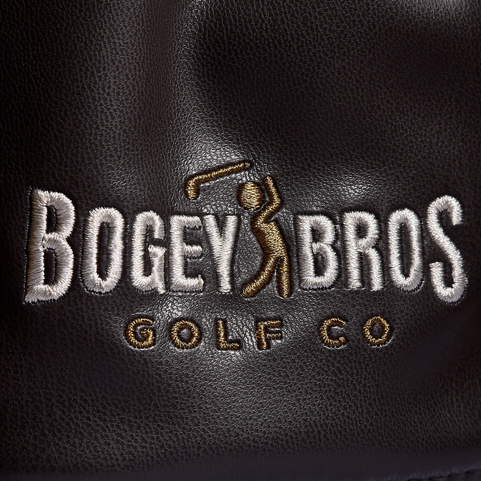 Embroidered on premium PU leather, the Liter-O-Cola - Driver Headcover features “BOGEY BROS GOLF CO” with a gold silhouette of a golfer swinging a club between “BOGEY” and “BROS,” creating an elegant design perfect for your driver head cover.