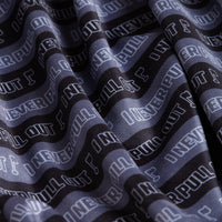 The I Never Pull Out - Polo features black moisture-wicking fabric with wavy white stripes, repeating “I NEVER PULL OUT” in bold white and gray letters plus a musical note for a rhythmic, eye-catching design and ultimate comfort.
