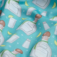 The Tequila - Polo features a playful turquoise fabric adorned with tequila bottles, shot glasses, lime wedges, and salt shakers. Its athletic fit and moisture-wicking properties deliver comfort alongside a fun, festive design.