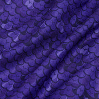 The Eyes Up Here - People Eaters - Women's Polo features soft purple fabric with a repeating scale-like pattern in varying shades, an athletic fit, and a textured effect that resembles fish or reptile scales.