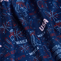 Celebrate American pride in the 'Merica - Navy - Women's Polo, featuring blue fabric with red, white, and blue fireworks, sunglasses, drinks, “USA,” and fun phrases. Enjoy an athletic fit and UPF 50 protection for all-day comfort.