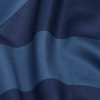 Close-up of blue fabric with alternating dark and light blue stripes on the Washed Up - Women's Polo. Its soft, smooth texture and moisture-wicking properties keep you comfortable during any activity.