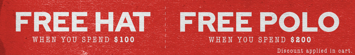 Red banner with bold white text: FREE HAT when you spend $100 and FREE POLO when you spend $200. Small text at bottom right: Discount applied in cart. Text is separated by a dashed line.