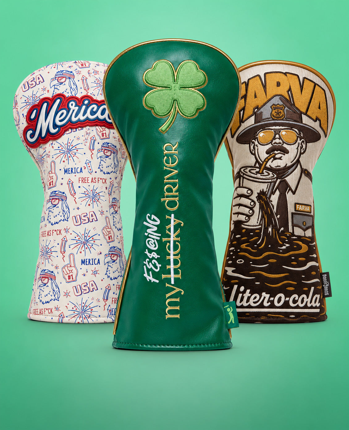 Three golf club headcovers on a green background: one is blue and black with Natural SLICE, one resembles a bearded man wearing sunglasses with faux fur, and one is yellow with black stripes and the text STUDENT DRIVER Please be patient!. Collection