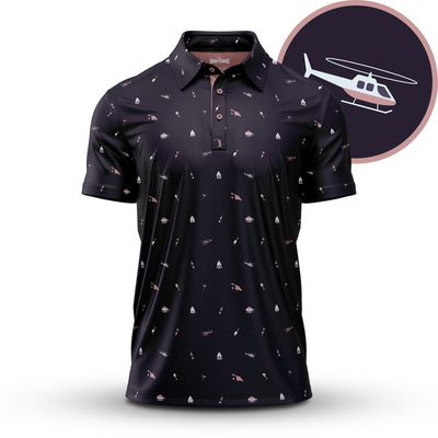 The Mixer - Polo is a black collared shirt featuring small white and pink helicopters, boats, and sailboats. Designed with an athletic fit, it has a circular inset showing a mauve background with a white helicopter outlined in pink.