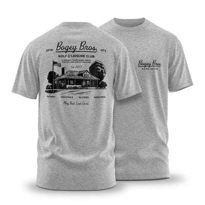 The Vintage Club - T-Shirt features “Baggy Bros Golf & Leisure Club” on the pocket, a bold back graphic, and the slogan “Play bad. Look good.” Crafted in soft, stretchy cotton-polyester for an athletic fit. Enjoy snacks, cocktails, and good times.