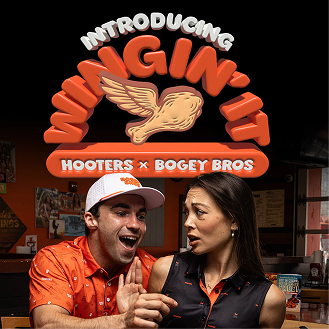 Promotional image for Wingin It, a Hooters and Bogey Bros collaboration. The text sits atop a photo of a man in an orange golf shirt and a woman in a black top, both looking surprised while sitting in a restaurant. The graphic features a stylized, winged chicken drumstick icon.